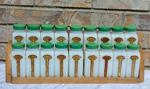 lot 4 image: Griffiths Eighteen Mill Glass Spice Bottles & Caddy