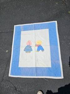 lot 67A image: Charming Childs Quilt Featuring Rural Clothing Motif