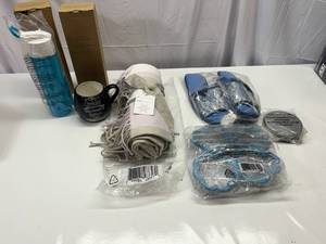 lot 12 image: MM. 2 Silcone Hydration Bottles, Coffee & Cookie Mug, Slippers, Soft Throw, Cookie & Biscuit Cutters