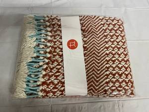 lot 261 image: Burnt Sienna, White, and Teal Knitted Throw Blanket