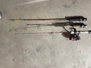 lot 25 image: Ice fishing rods and 1 reel...