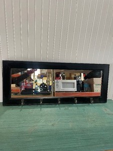 lot 42 image: Black framed mirror with hooks...