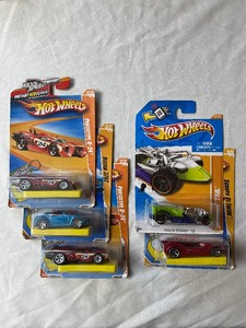 lot 137 image: 5 Orange Hot Wheels...