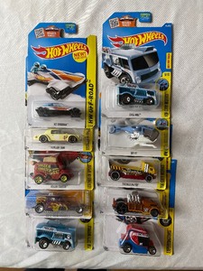 lot 138 image: 10 Yellow Hot Wheels...