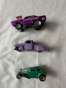 lot 146 image: 3 Purple cars...