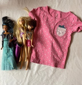 lot 162 image: Lot of dolls and a T-shirt...