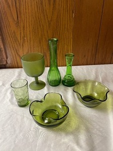 lot 171 image: Green glass vases and bowls...