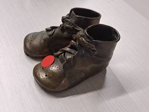 lot 134 image: Lot of (One Pair) Bronze Baby Shoes