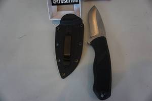 lot 14 image: TRS Brand The Fang 3 .25 Knife With Sheath