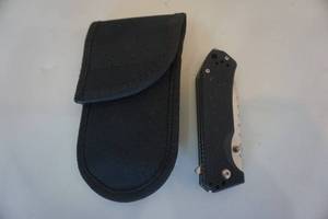 lot 35 image: Off Grid Brand Folding Knife With Sheath