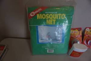 lot 75 image: Coghlans Mosquito Net With 3 Bug Band Insect Repelling Wrist Bands, & Bug Band Towelettes