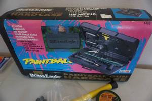 lot 121 image: Brass Eagle Model 1400 Paint Ball Gun Storage Case Blow Gun, Camo Face Paint and Paint Remover