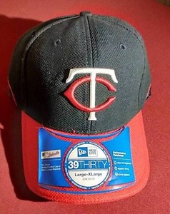 lot 99 image: Nice New Era 39Thirty Twins Cap Autographed by Ron Gardenhire
