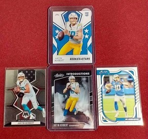 lot 143 image: (4) Justin Herbert Cards - One Rookie