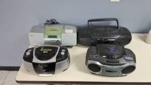 lot 20 image: Vintage-  (4) Variety Portable CD, AMFM Radios