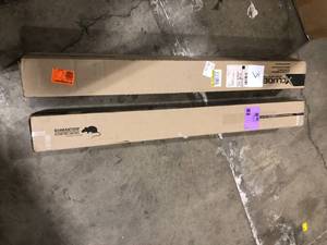 Lot of  12 ft. x 2 in. x 1.625 in. Rodent Proof Roll-Up Door Seal Kit by Xcluder  Customer Returns See Pictures