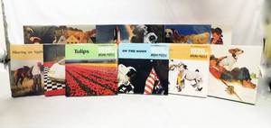 lot 54 image: Lot of 4 Hoyle 1020 Piece and 8 Hoyle 550 Piece Jigsaw Puzzles
