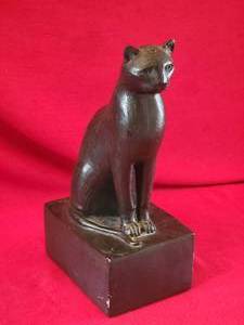 lot 56 image: Mysterious Perched Cat Statuette