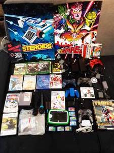 Large lot of assorted video games and accessories