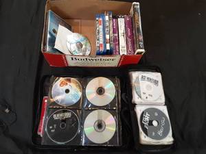 2 books full of DVDs and blu-rays