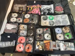 Large assortment of CDs and a few vintage Concert t-shirts