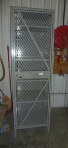 lot 9 image: Metal storage cabinet 24x21x77