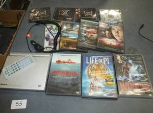 lot 55 image: Portable DVD player and lot of movies