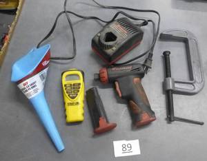 lot 89 image: Snap On screwdriver with extra battery (works) funnel, clamp and laser line