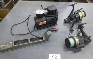 lot 92 image: portable air compressor to air your tire, fishing reels