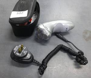 lot 102 image: Norelco 3 head shaver