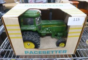lot 115 image: Pacesetter Vodka decanter of a John Deere Tractor, empty
