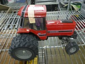 lot 118 image: Pacesetter Vodka decanter of a International Tractor, empty, no muffler or box for this one