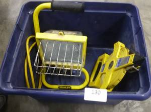 lot 130 image: Tote with a work light and a 100ft tape