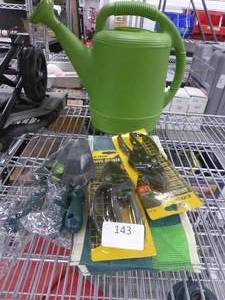 lot 143 image: Garden pruners, shovels, watering jug and Fiskars pruner