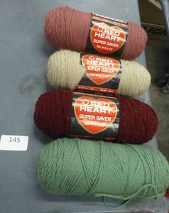 lot 145 image: Four new skeins of yarn