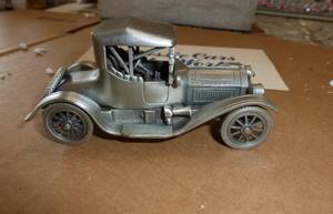 lot 236 image: Pewter collectible Cadillac and Simplex cars