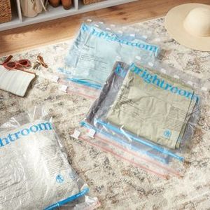 lot 75 image: Large 5pc Compression Travel Bags Clear - Brightroom