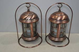 lot 31 image: 2 Copper IndoorOutdoor Candle Lanterns