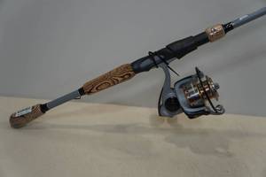 lot 102 image: Ozark Trail OTX Spinning Rod & Reel Combo