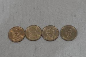 lot 54 image: 4 US Presidential Dollar Coins -Polk, Tyler, Taylor, Harrison