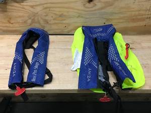 lot 110 image: 2-Pack of Bass Pro Shops AM24 AutoManual Inflatable Life Vests