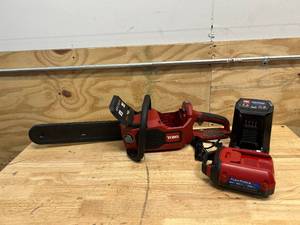 lot 133 image: TORO 60V MAX 16 in. Brushless Chainsaw with 2.0Ah Battery and Charger Model 51850