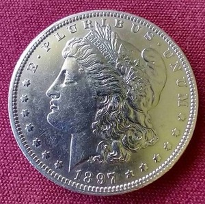 lot 12 image: Nice 1897-O Morgan Dollar