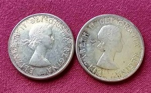lot 44 image: (2) Canada Silver Half Dollars