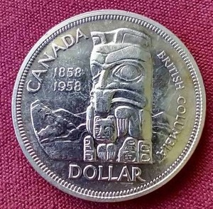 lot 47 image: 1958 Canada Silver Commemorative Dollar Coin
