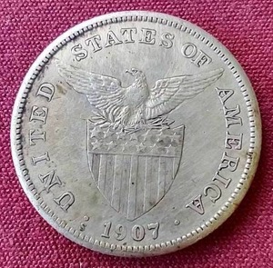 lot 60 image: 1907 Philippines Silver 1 Peso Coin