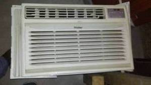 lot 561 image: Haier Window AC 12,000 BTU