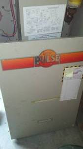 lot 577 image: Lennox Pulse Gas Furnace, high efficiency with  AC unit and A coils.