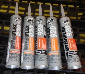 lot 596 image: DAP 920 Dynaflex Caulk (5 Tubes)