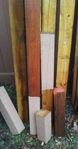 lot 606 image: 4 x 4 green treated posts qty. -8.   5 to 6 footers